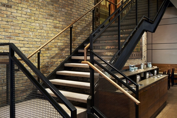 A Step Up in Starbucks Design Appeal: Wovenpanel® Stair Railing