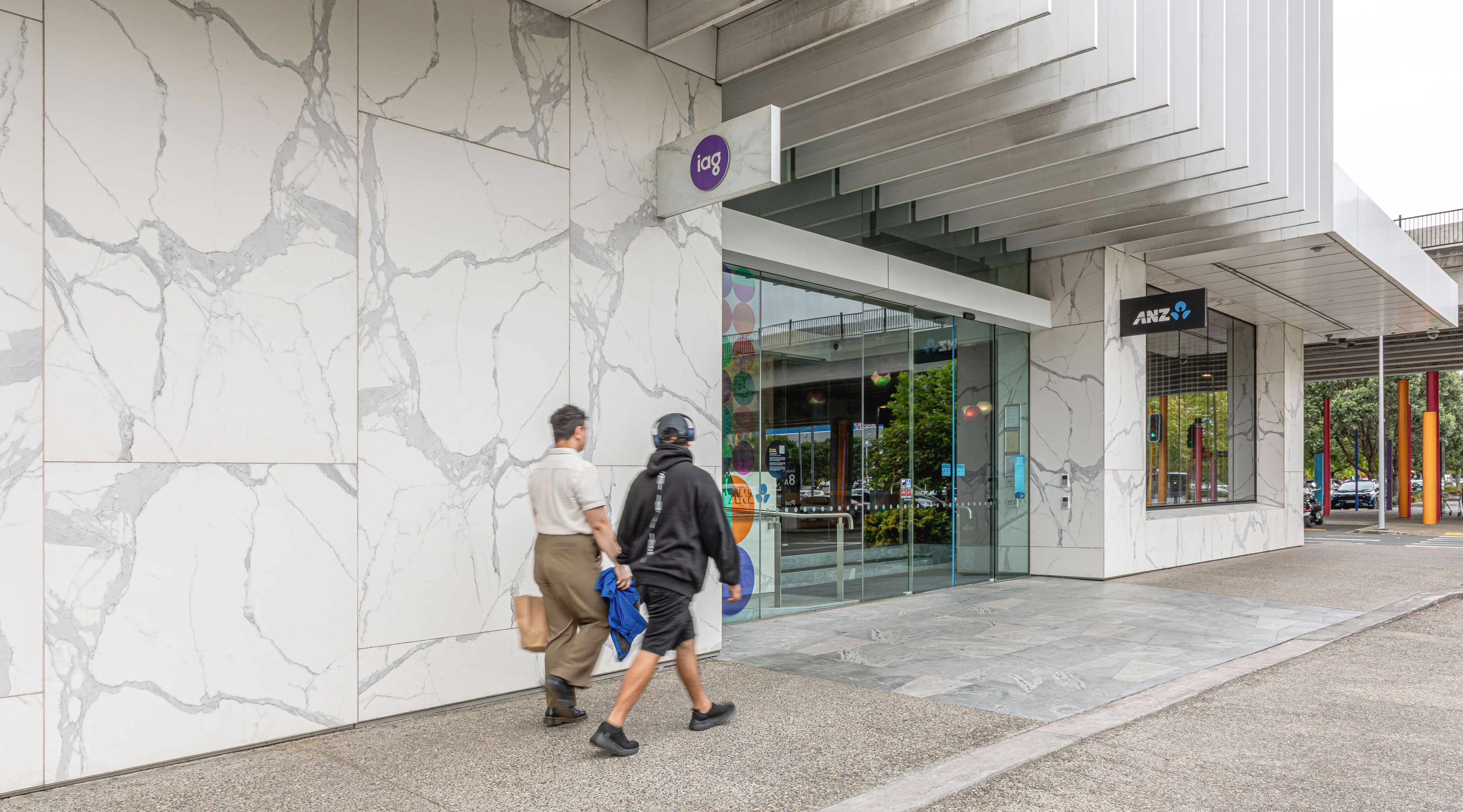 This image showcases a facade project featuring a Florim Marble Statuario finish