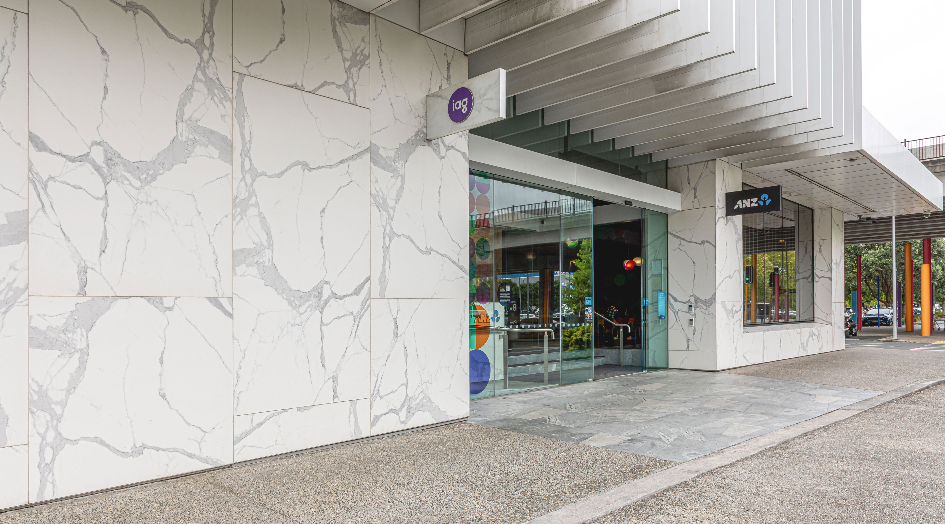 This image showcases a facade project featuring a Florim Marble Statuario finish