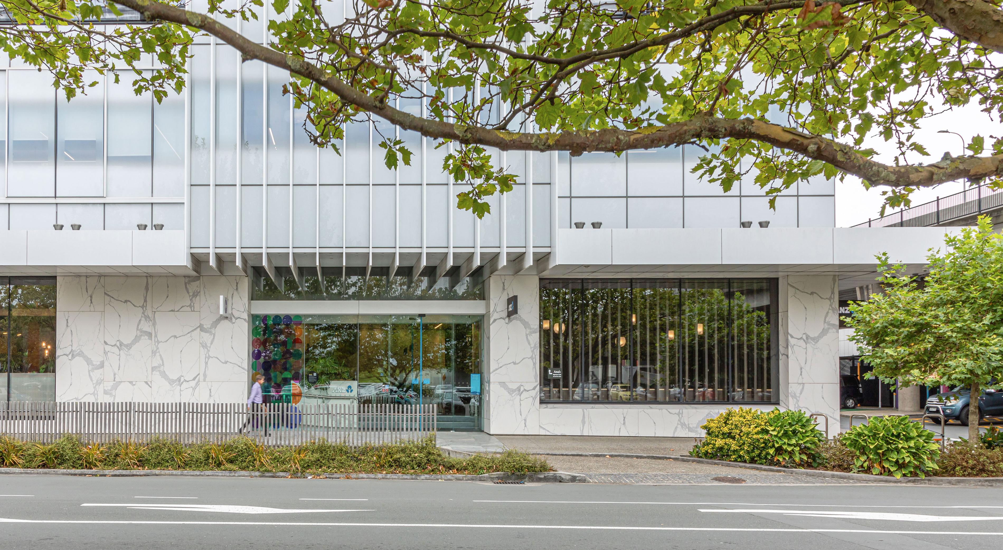 This image showcases a facade project featuring a Florim Marble Statuario finish