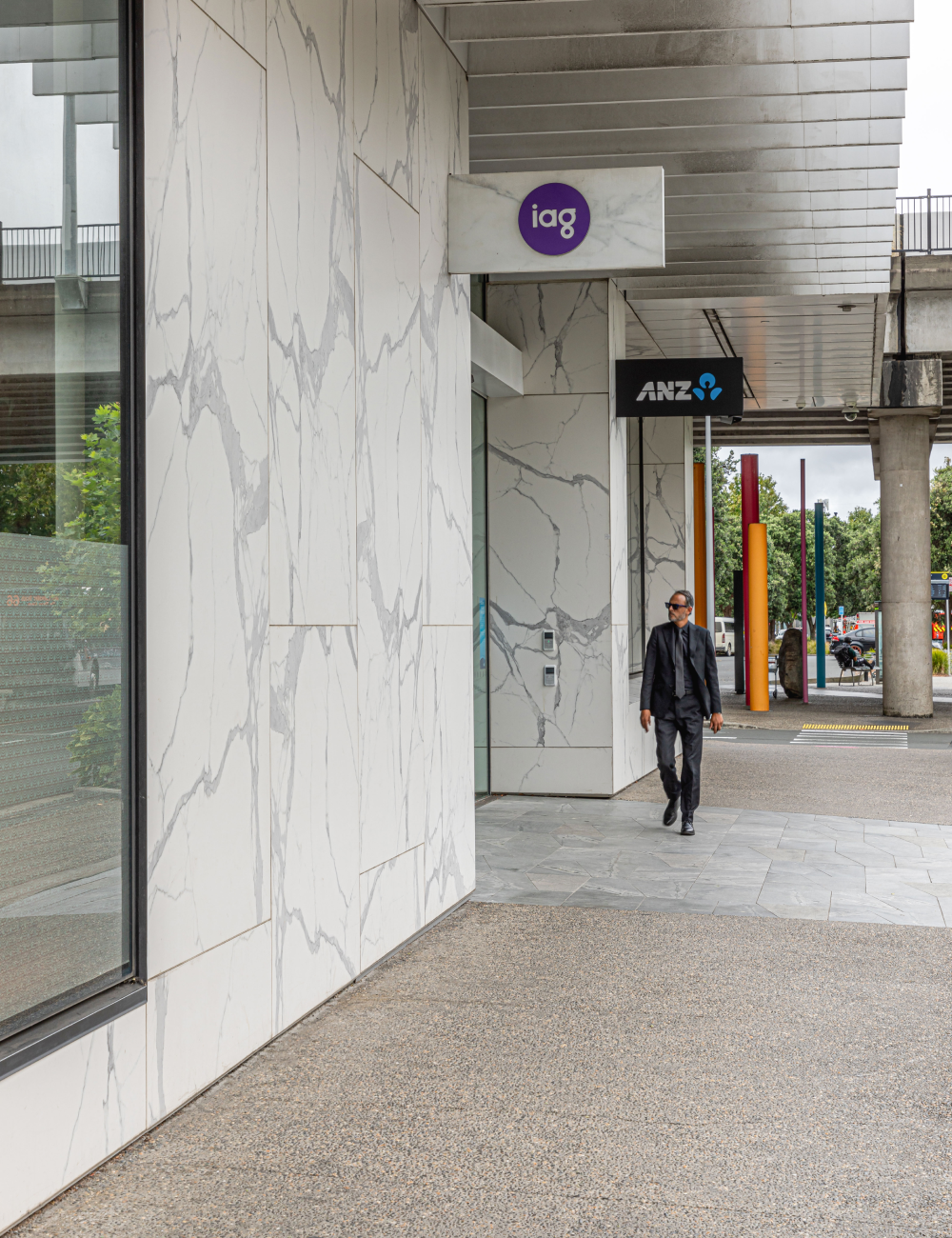 This image showcases a facade project featuring a Florim Marble Statuario finish