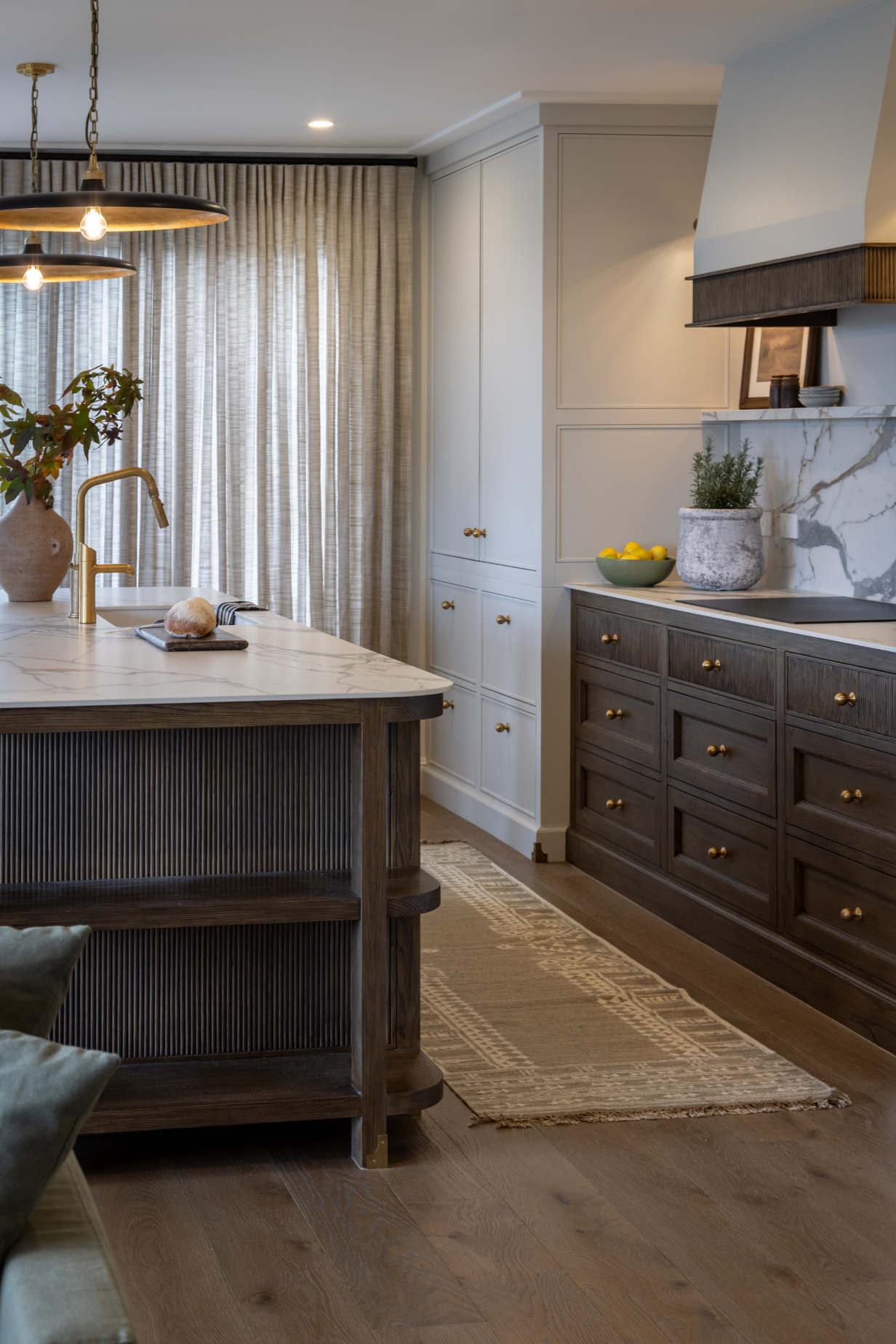 This image showcases a kitchen project featuring a Florim Stone Marfil