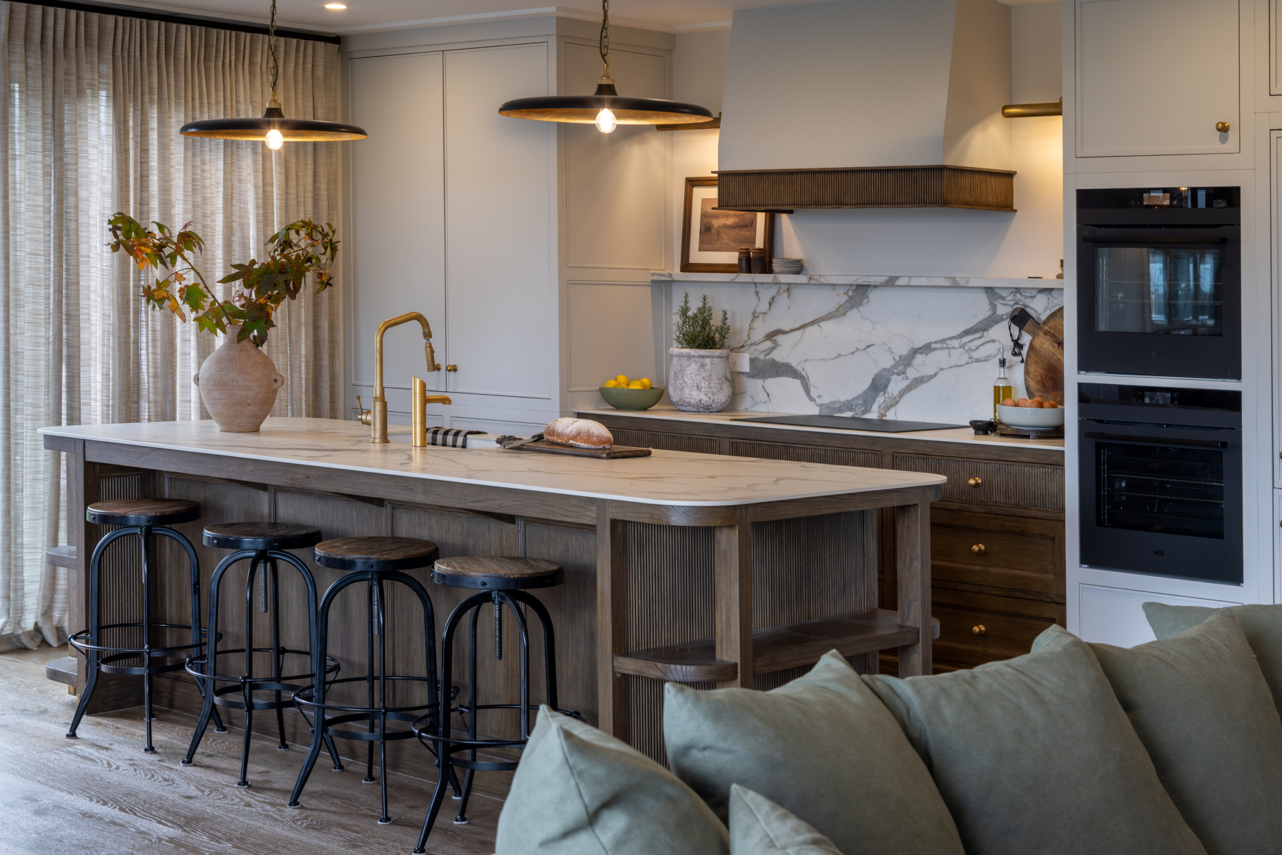 This image showcases a kitchen project featuring a Florim Stone Marfil