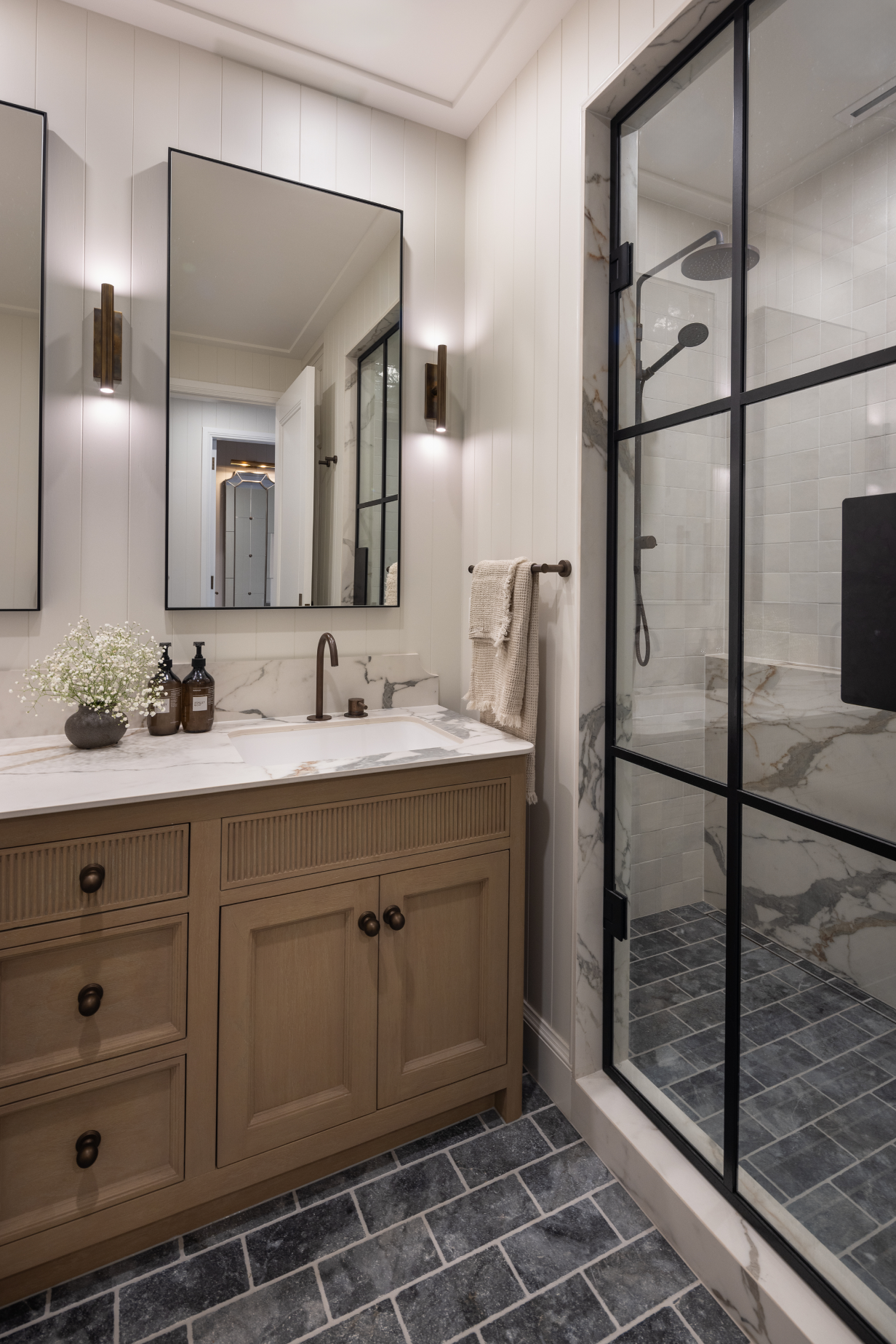 This image showcases a kitchen project featuring a Florim Stone Marfil