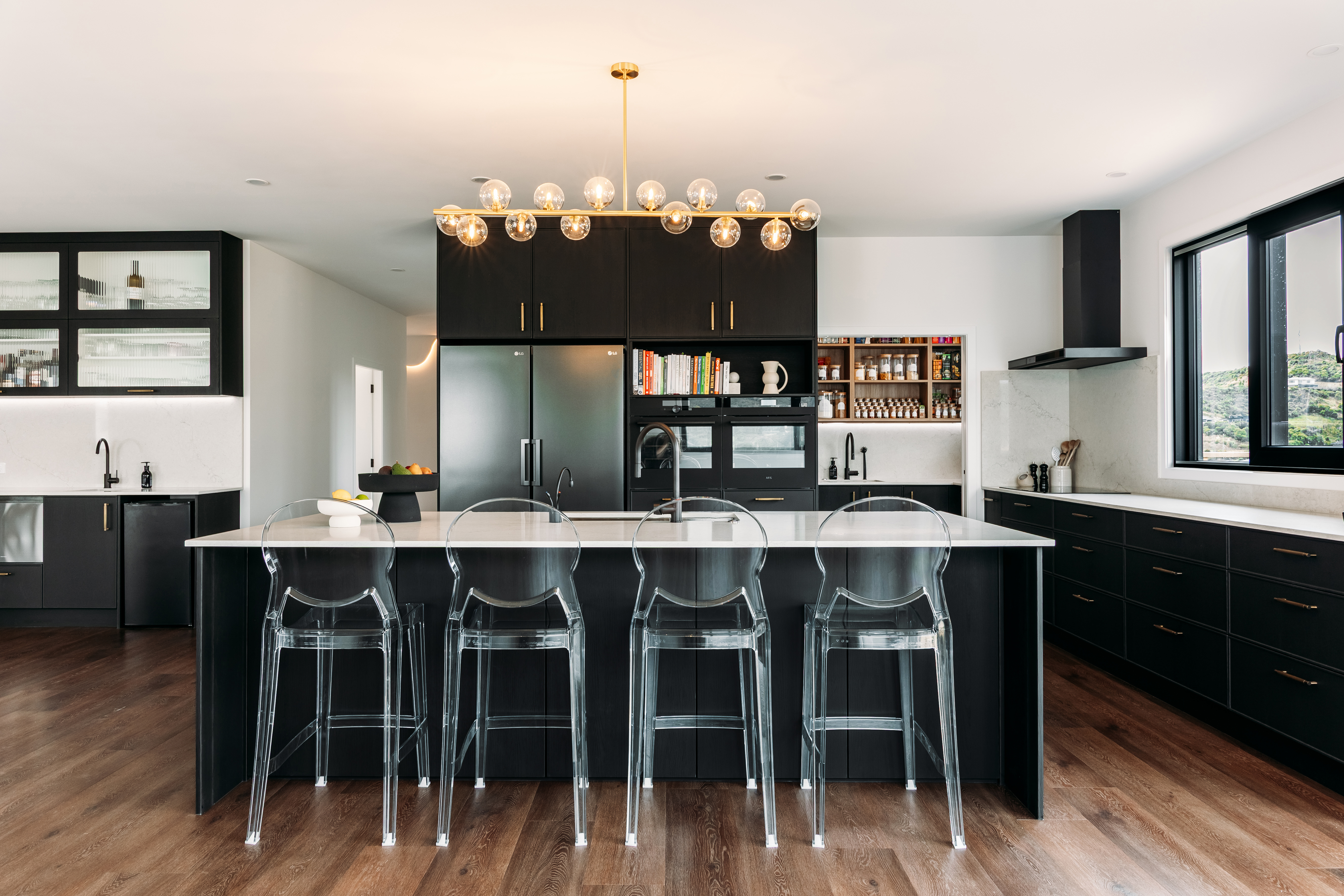 This image showcases a kitchen project featuring a Florim Stone Marfil