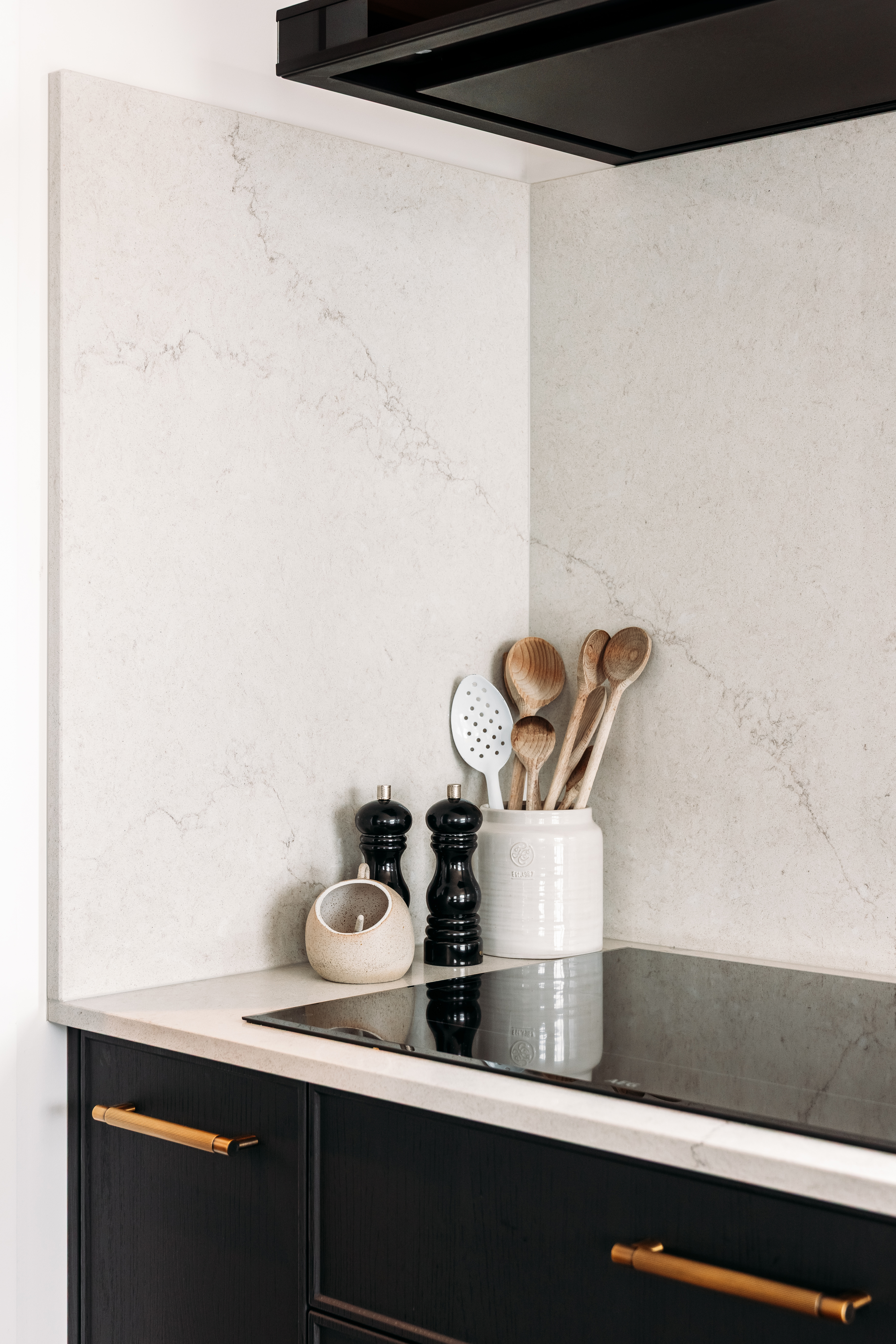 This image showcases a kitchen project featuring a Florim Stone Marfil