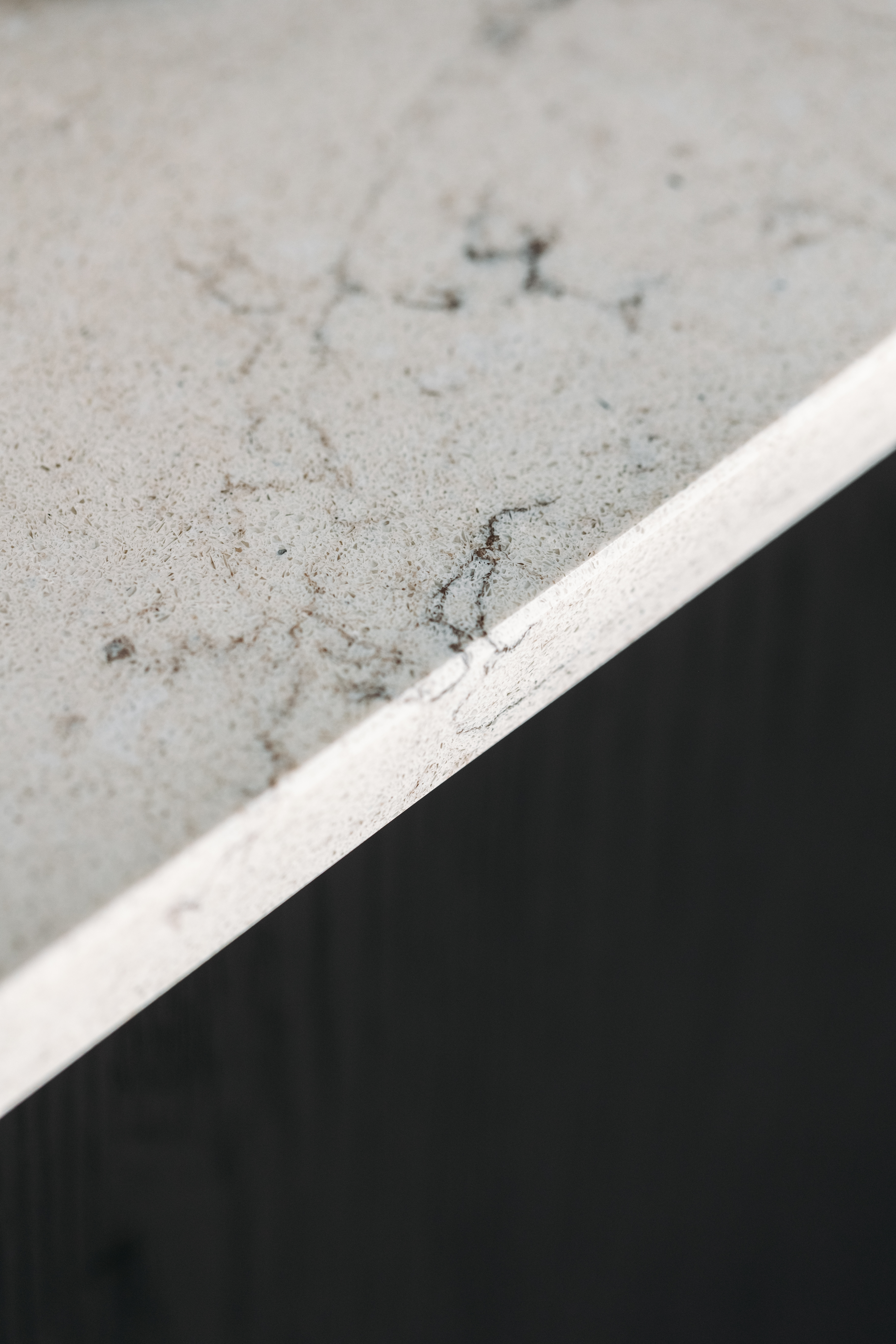 This image showcases a kitchen project featuring a Florim Stone Marfil