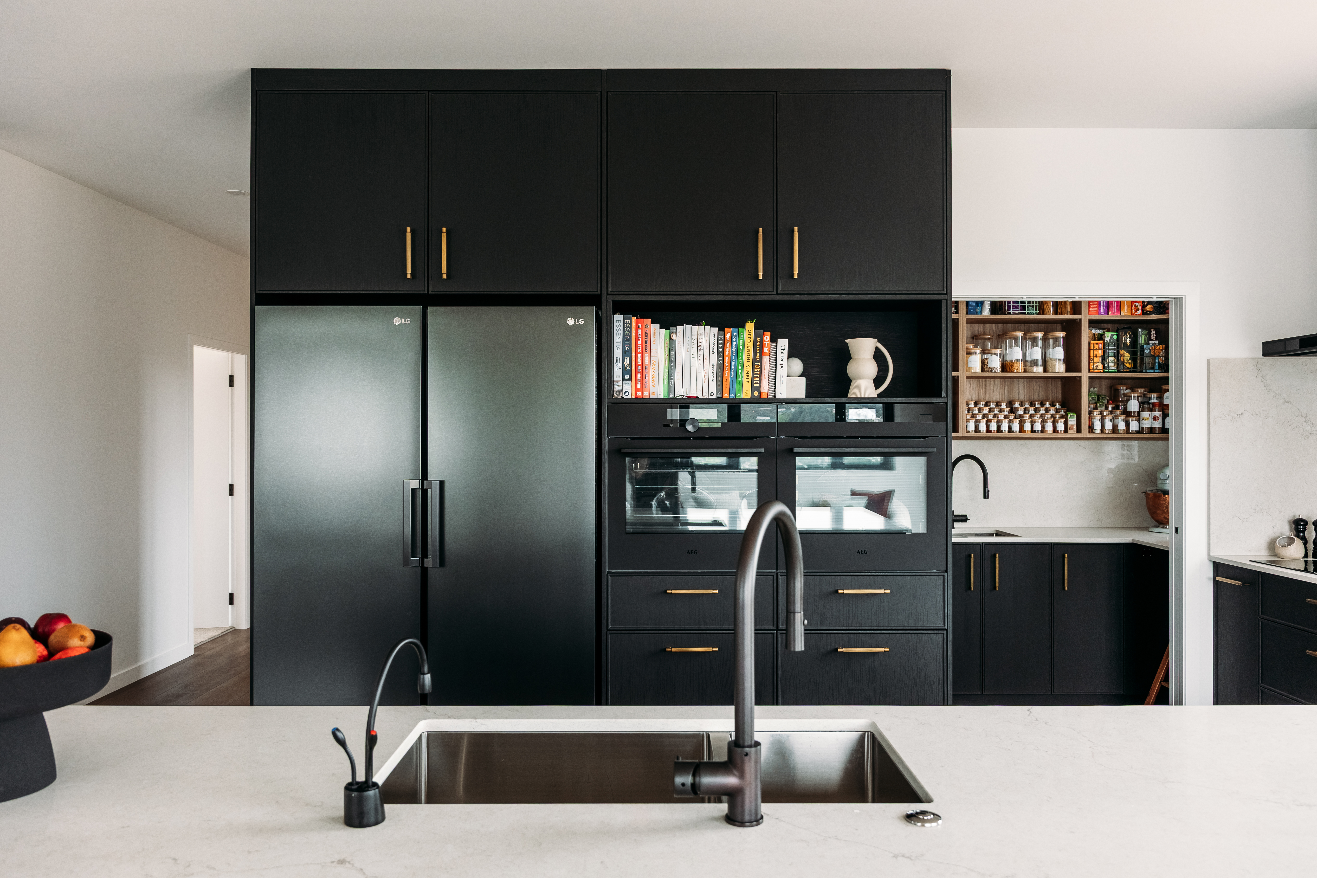 This image showcases a kitchen project featuring a Florim Stone Marfil