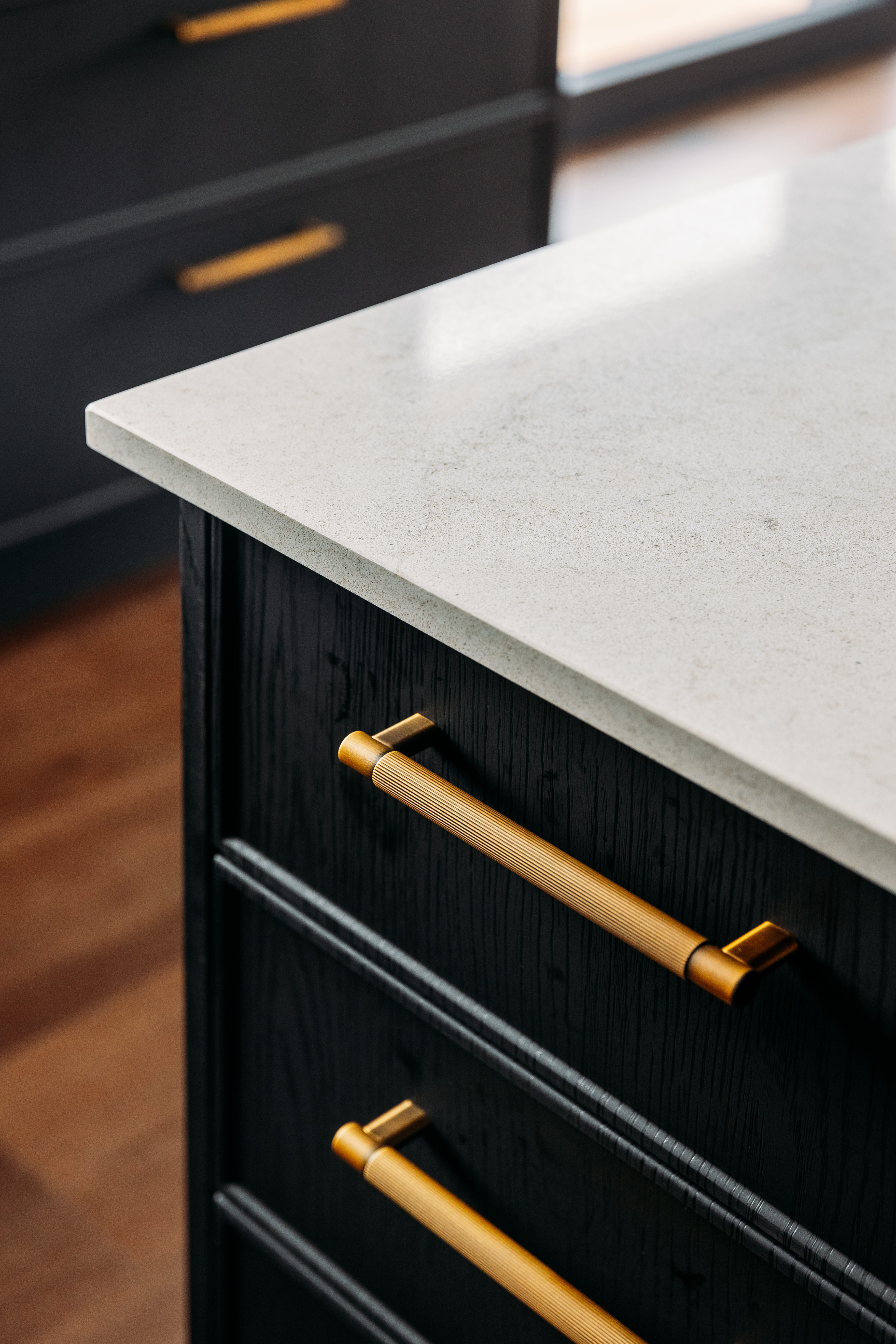 This image showcases a kitchen project featuring a Florim Stone Marfil