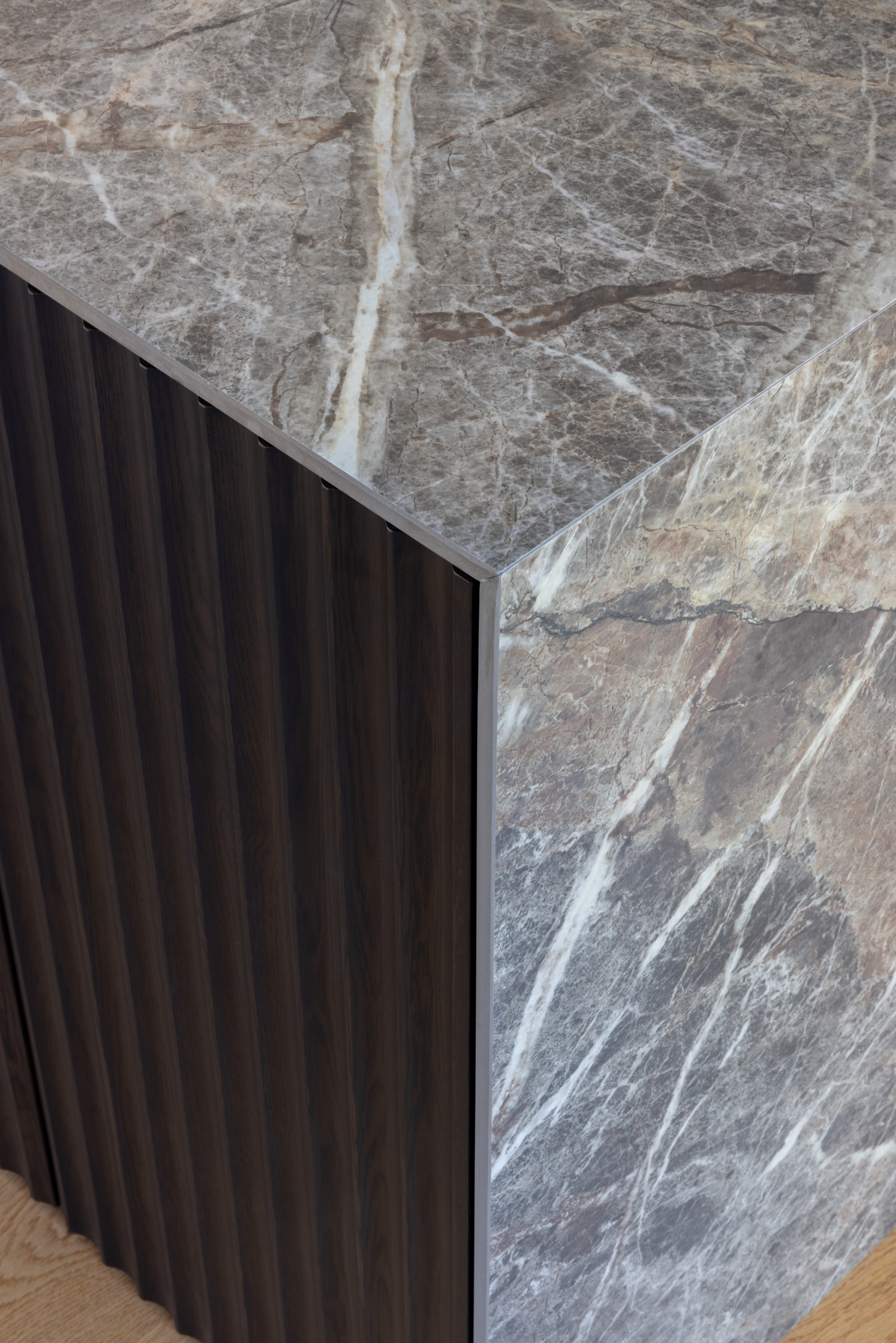 This image showcases a kitchen project featuring a Florim Stone Marfil