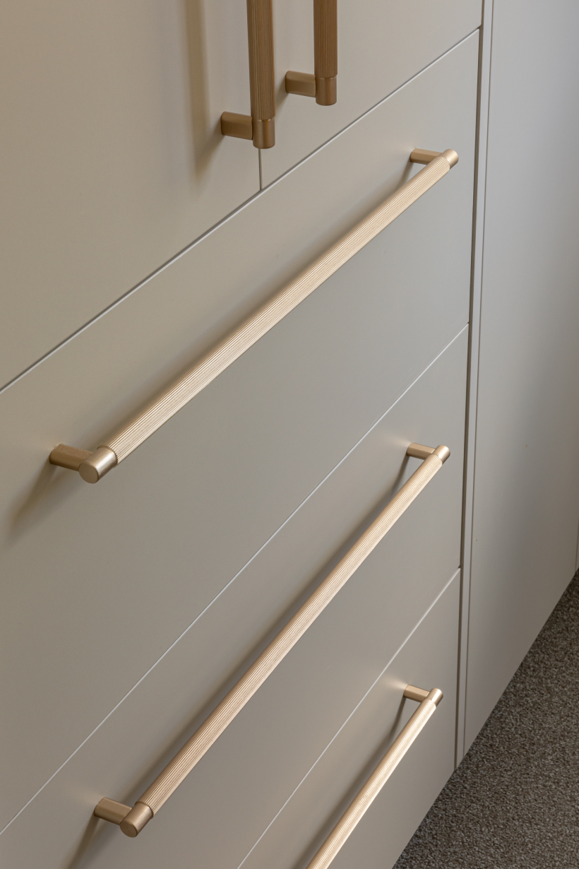 This image showcases a kitchen project featuring a Florim Stone Marfil