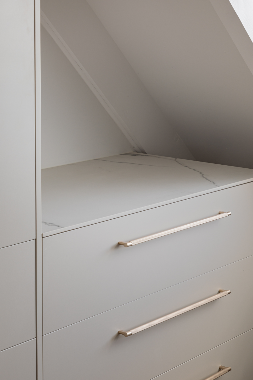 This image showcases a kitchen project featuring a Florim Stone Marfil