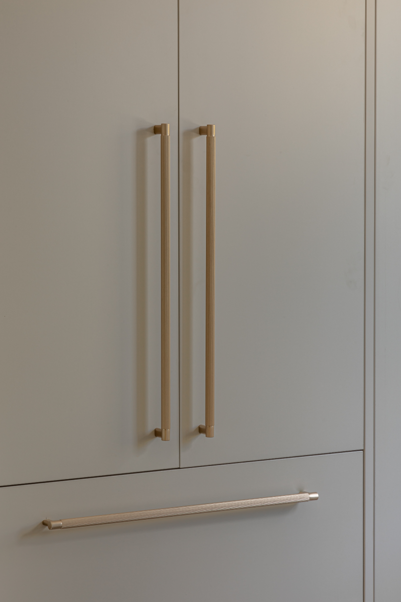 This image showcases a kitchen project featuring a Florim Stone Marfil