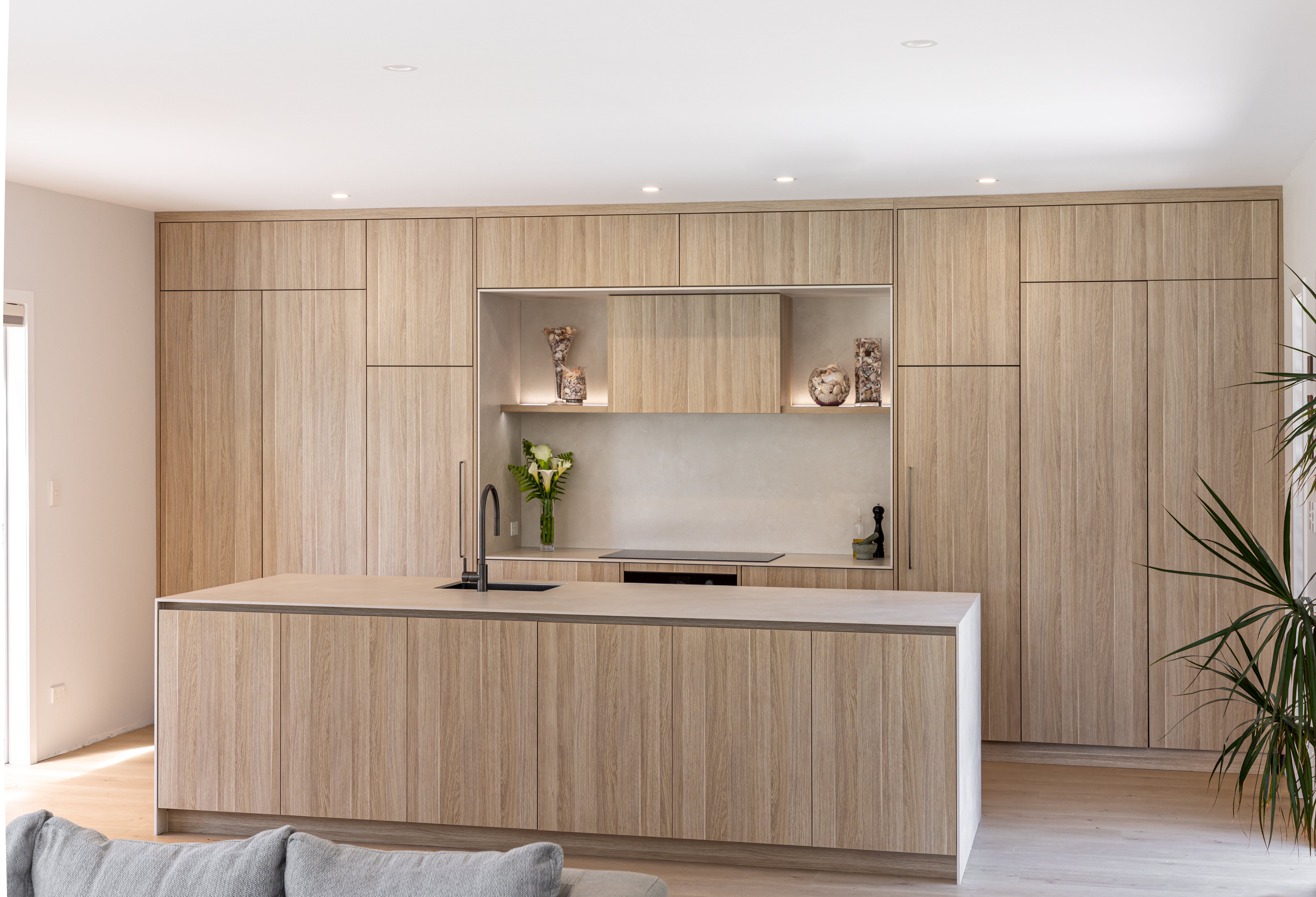 This image showcases a kitchen project featuring a Florim Stone Marfil