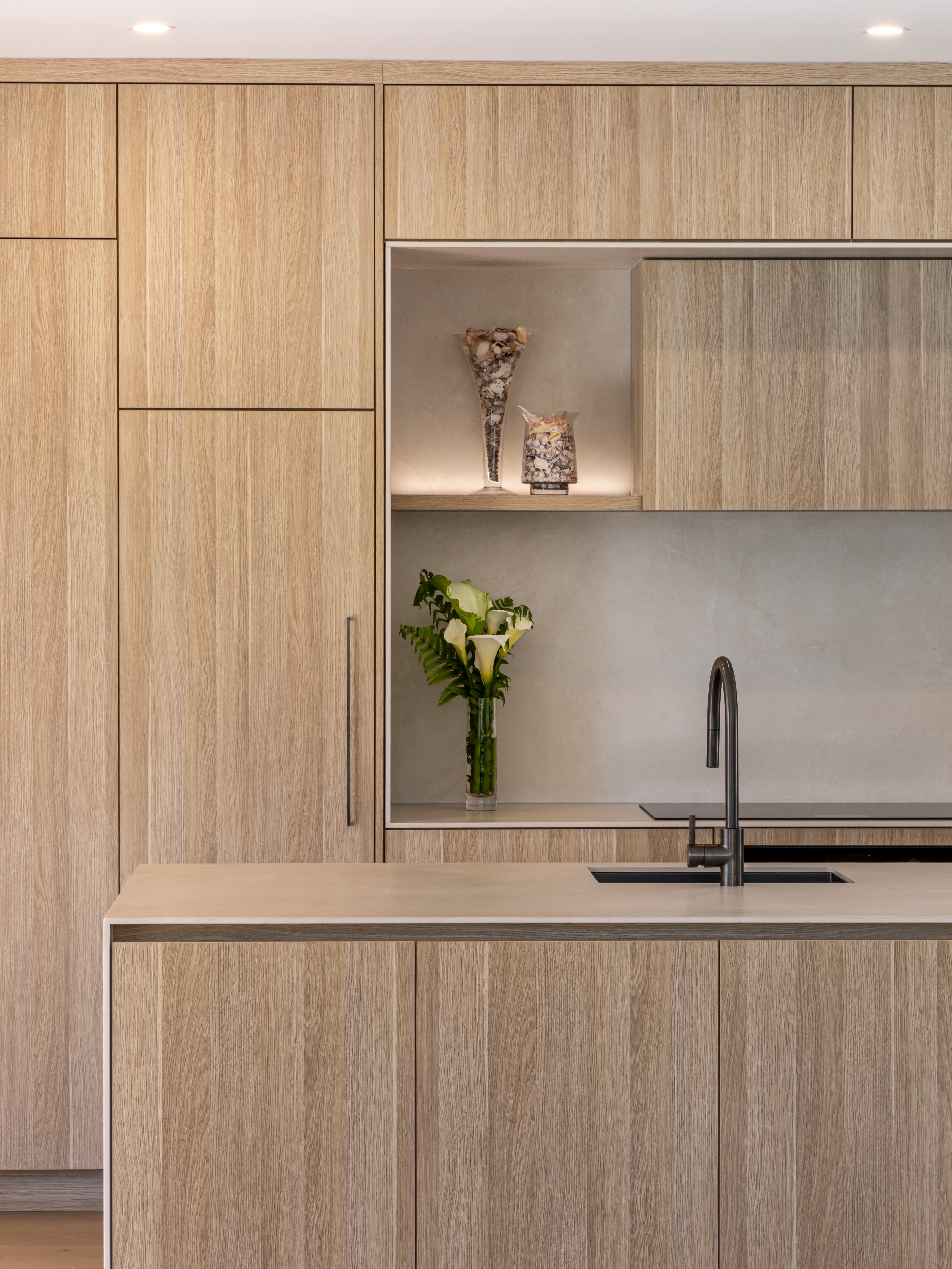 This image showcases a kitchen project featuring a Florim Stone Marfil