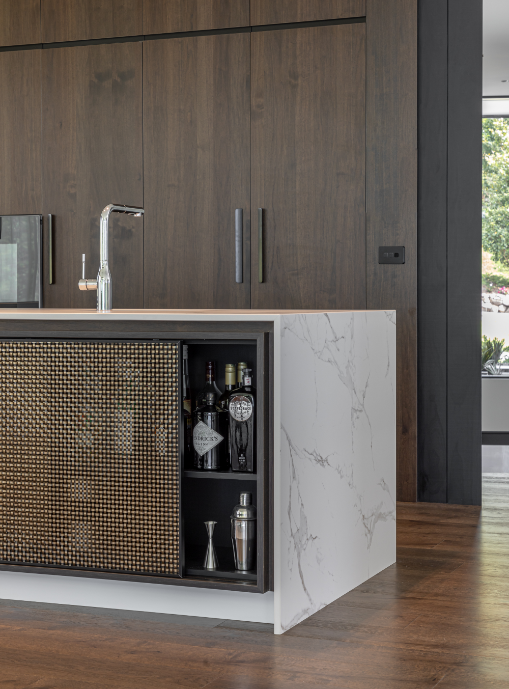 This image showcases a kitchen project featuring a Florim Stone Marfil