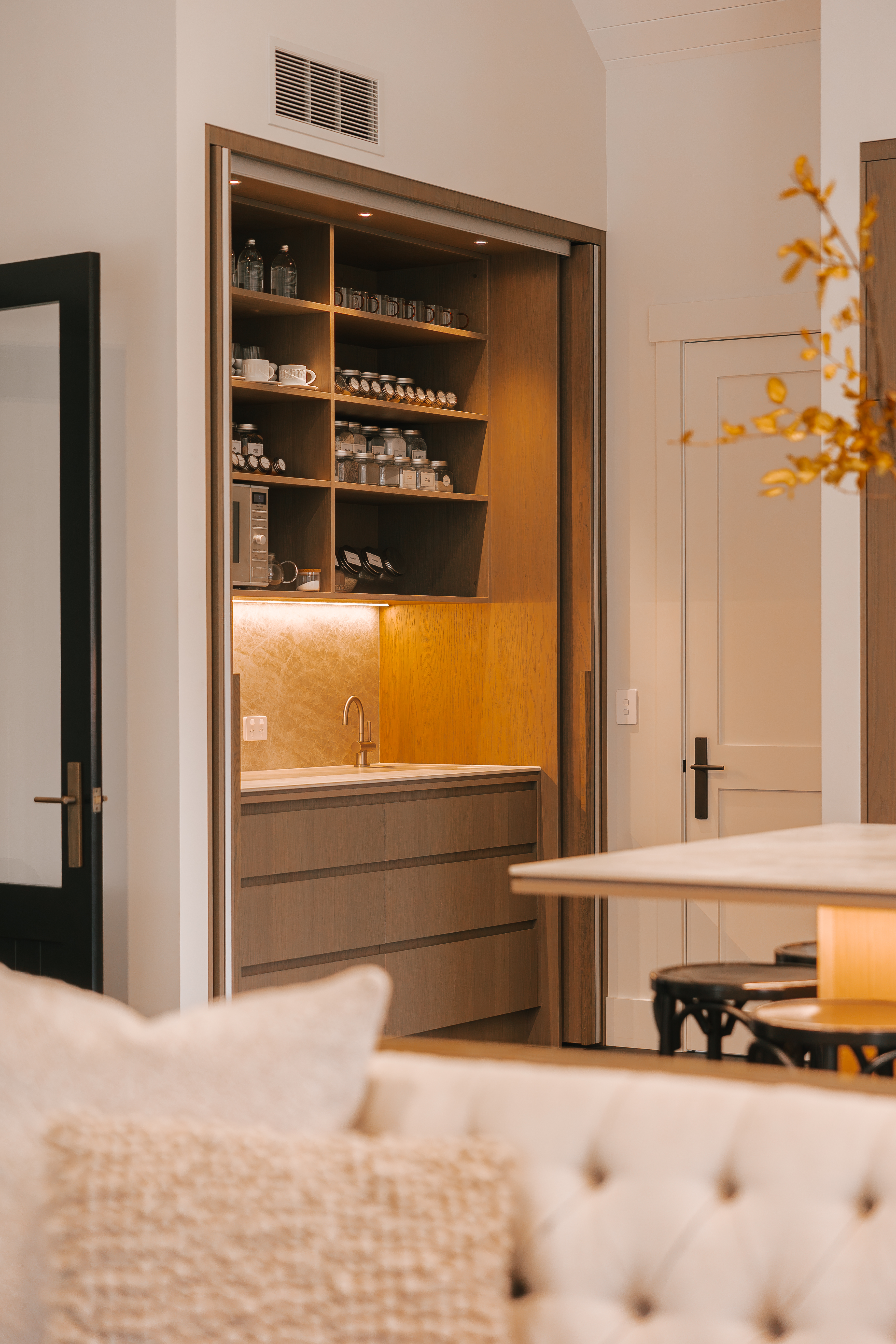 This image showcases a kitchen project featuring a Florim Stone Marfil