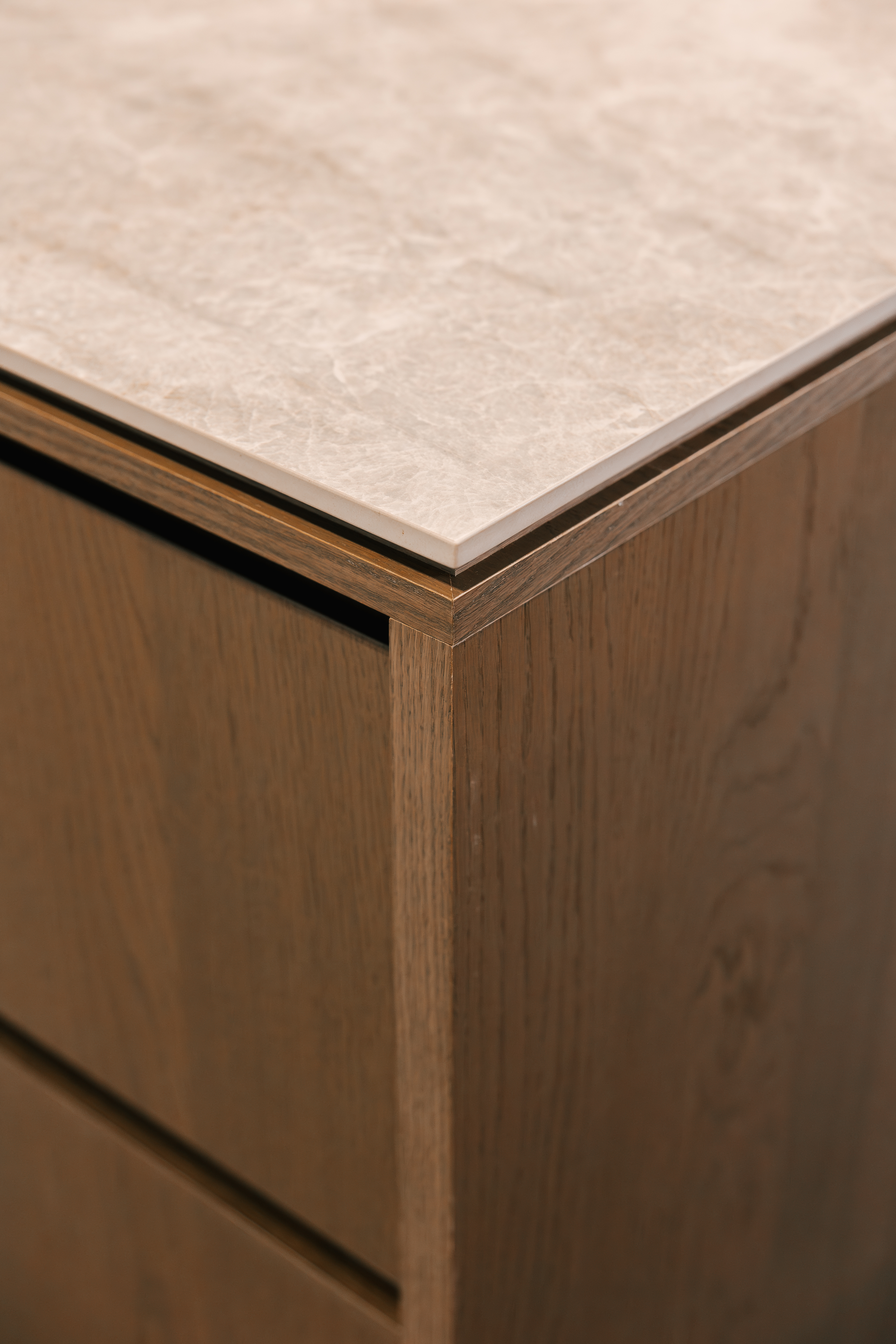 This image showcases a kitchen project featuring a Florim Stone Marfil