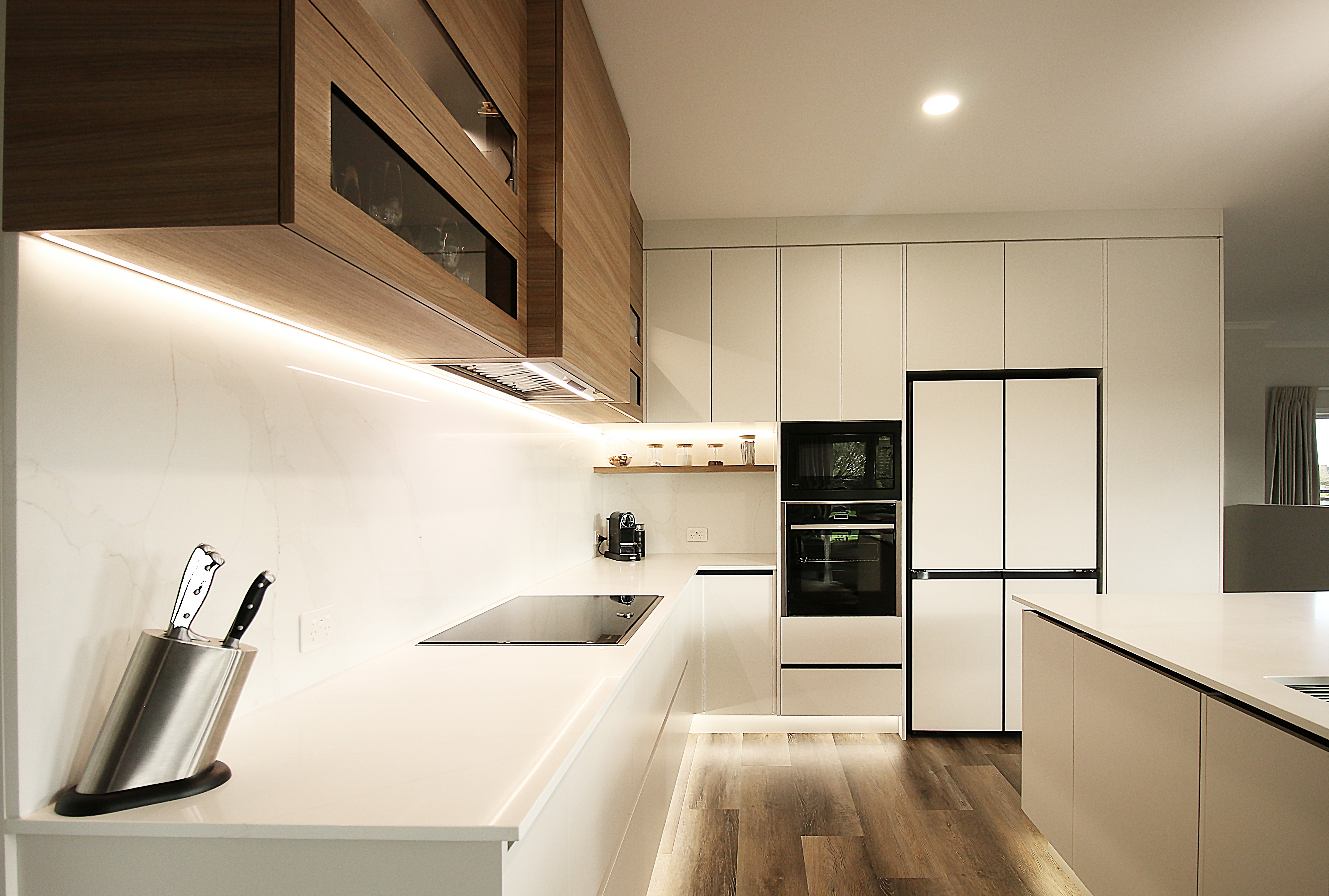 This image showcases a kitchen project featuring a Florim Stone Marfil