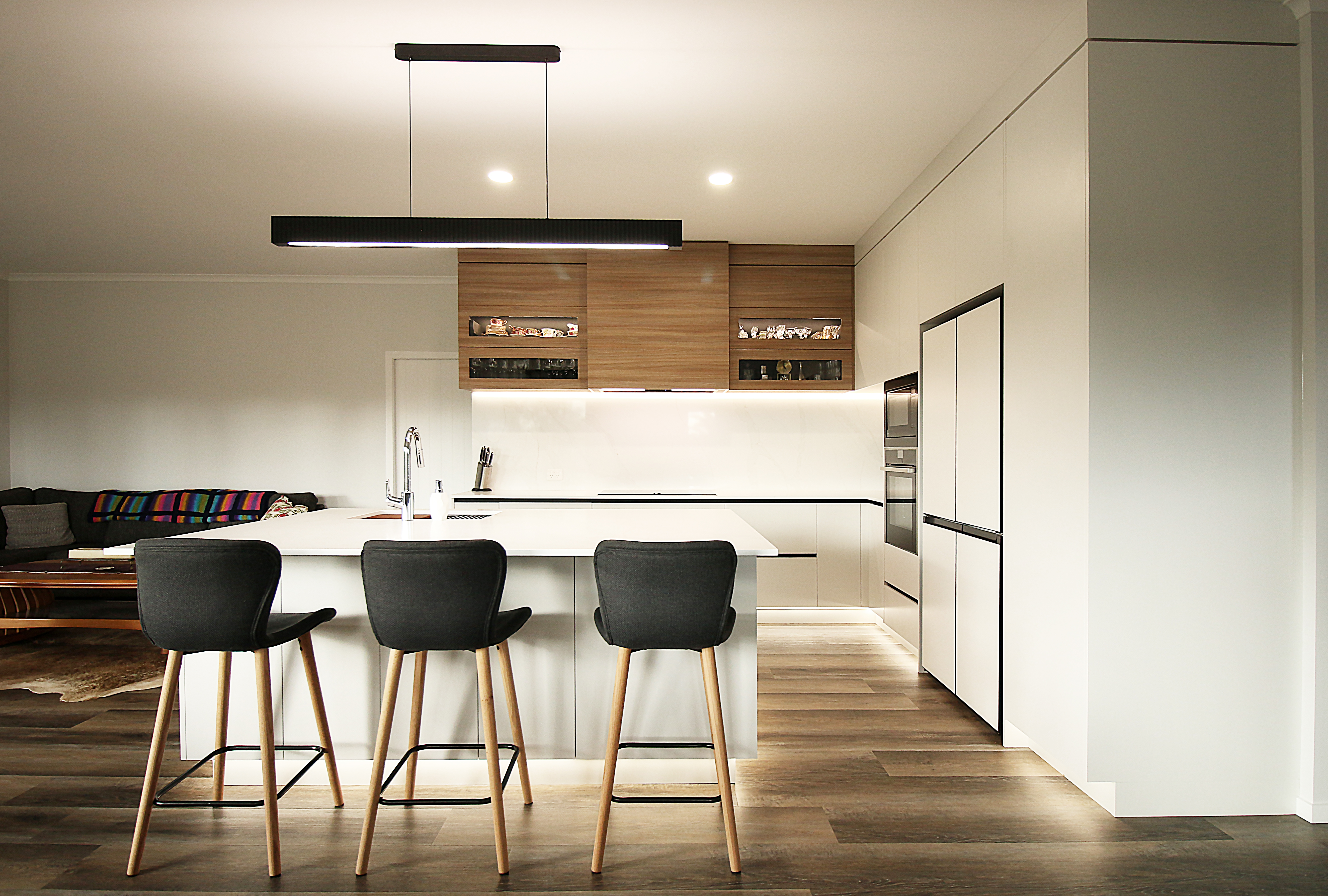 This image showcases a kitchen project featuring a Florim Stone Marfil